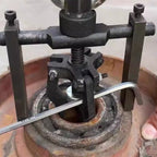 Arenzza multi-function 3-jaw bore puller tool for car accessories, showing the tool with three adjustable jaws and metal construction.