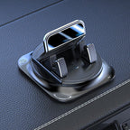 Arenzza anti-slip fixed car phone holder mounted on a vehicle dashboard, securely holding a smartphone for safe driving.