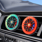 Arenzza car air vent aromatherapy diffuser attached to a vehicle's air vent, with a sleek design and aromatic essential oils inside.