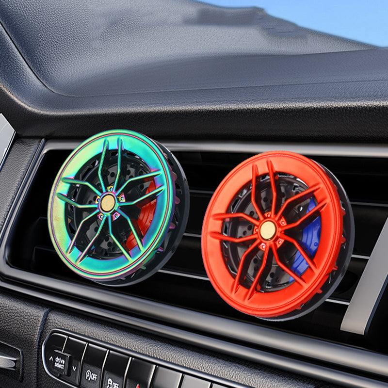 Arenzza car air vent aromatherapy diffuser attached to a vehicle's air vent, with a sleek design and aromatic essential oils inside.