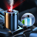 Arenzza Smart Car Diffuser set with light and spray modes, featuring a sleek diffuser and control buttons on a car dashboard.