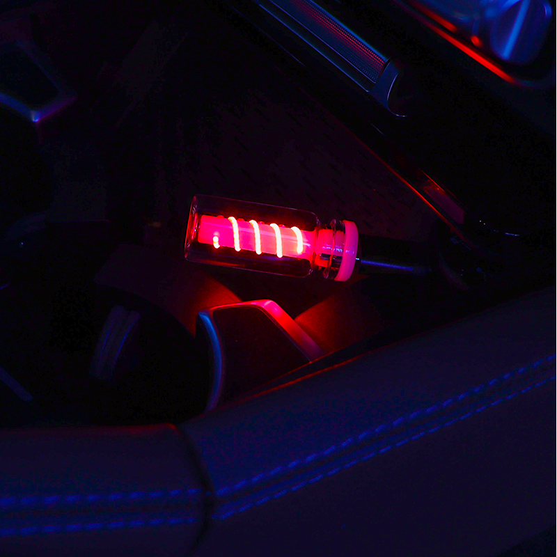 Arenzza USB LED car interior ambient lighting installed inside a vehicle, illuminating the cabin with soft, colorful light.