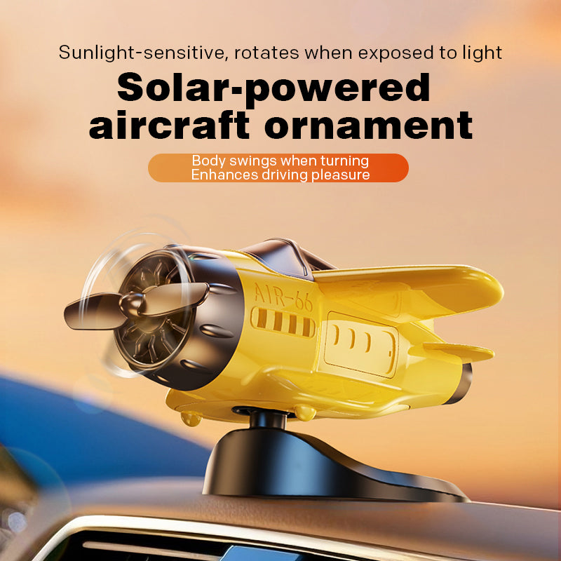 Arenzza solar-powered airplane-shaped car ornament attached to a vehicle's dashboard or rearview mirror.
