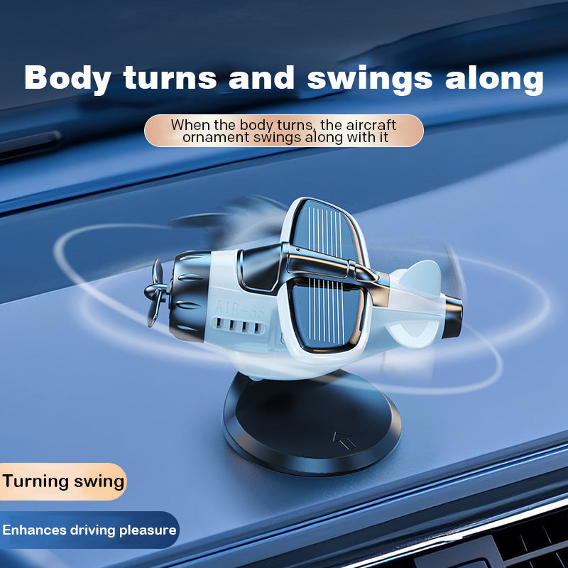 Solar powered airplane-shaped car ornament by Arenzza, a stylish car accessory for vehicle decoration and protection.