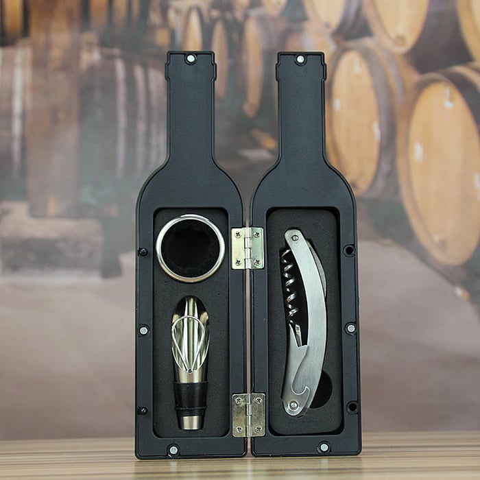 Arenzza wine opener set with corkscrew, foil cutter, and wine pourer on a wooden surface, ideal for wine lovers.