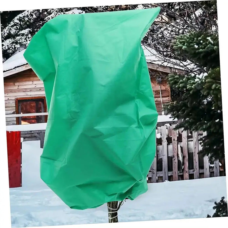 Arenzza plant freeze protection cover, thickened drawstring bag for winter garden frost protection, shown draped over plants.