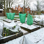 Arenzza plant freeze protection cover with drawstring, thickened material for winter frost protection, in a garden setting.