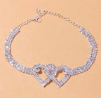 Arenzza Heart X Heart ankle bracelet with delicate chain and heart charms, displayed on a neutral background.