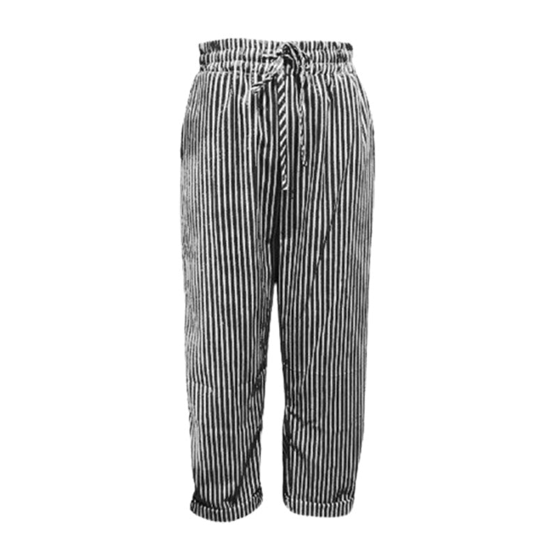 A woman wearing striped linen cotton trousers from Arenzza, showcasing effortless style and comfortable fit for everyday wear.