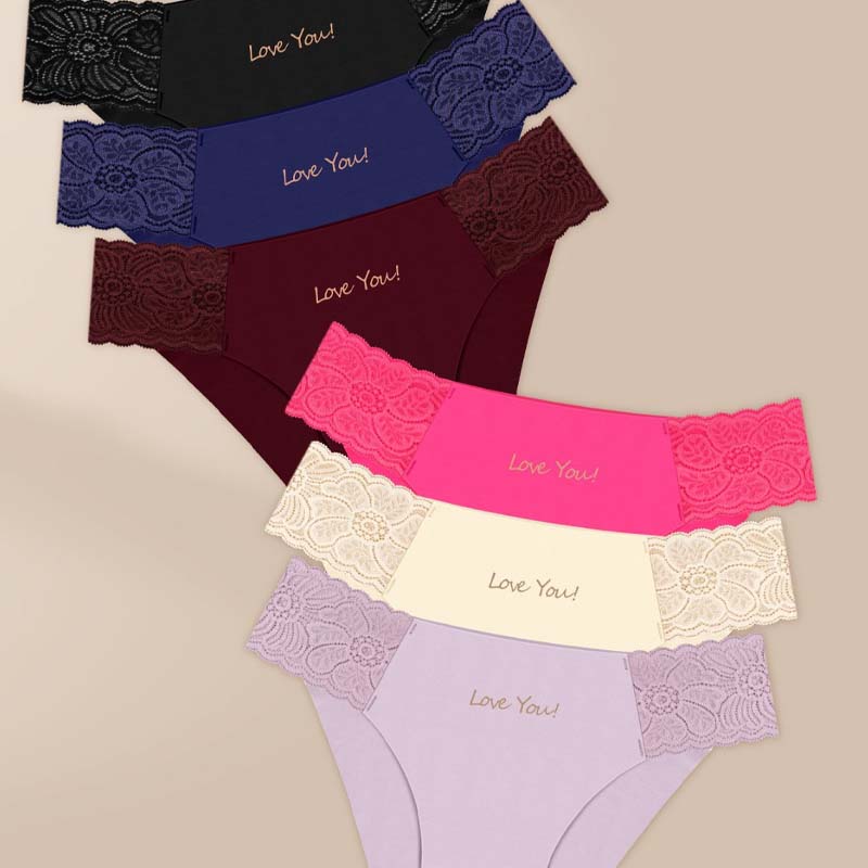 A woman wearing breathable letter print lace trim briefs from Arenzza, showcasing the soft fabric and stylish design.