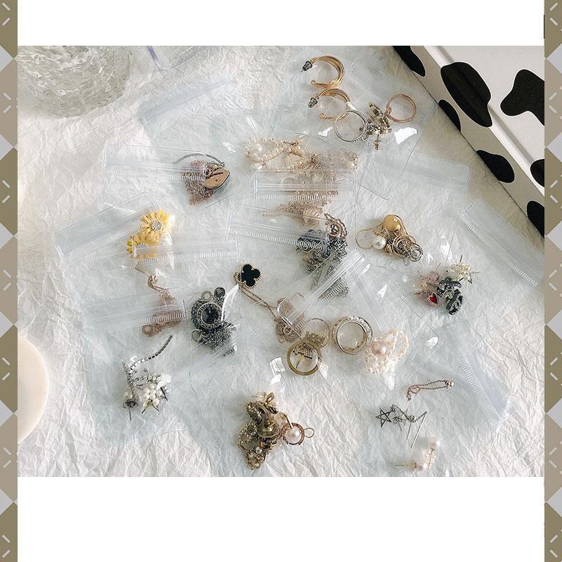 Arenzza jewelry collector's bag with multiple compartments and soft interior, designed for organizing and storing jewelry accessories.