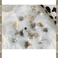 Aarenza jewelry collector's bag with multiple compartments for organizing necklaces, rings, and earrings, in soft fabric.