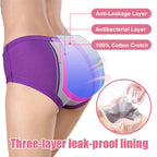 A woman wearing Arenzza women's high waist leak-proof panties designed for menstruation, in a neutral color, focusing on the fit and fabric.