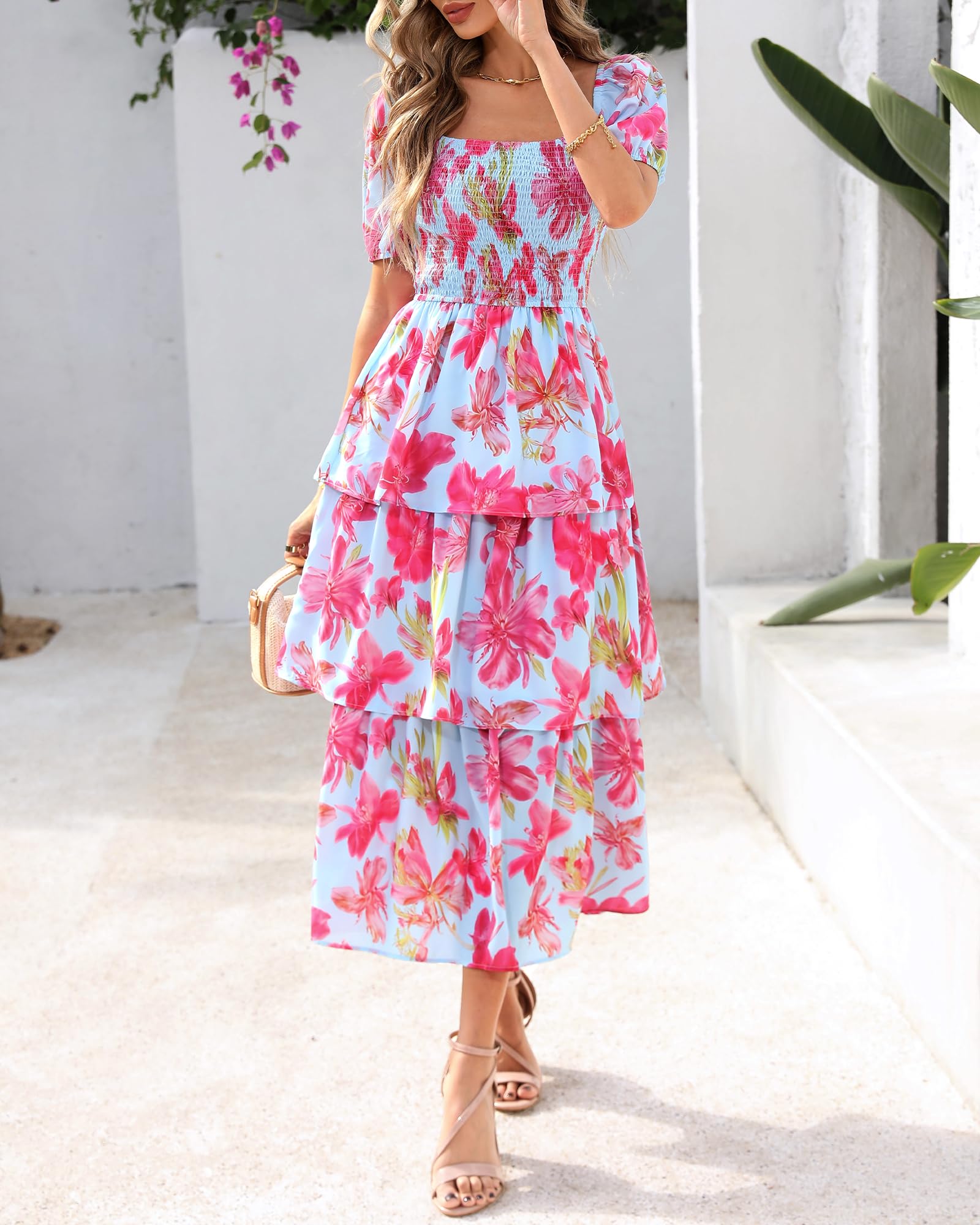 A women's floral square neck puff sleeve smocked tiered dress by Arenzza, featuring short sleeves and a summer floral pattern.