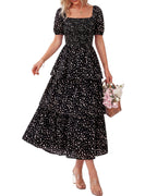 A women's floral square neck puff sleeve dress by Arenzza with smocked bodice and tiered design, perfect for summer.