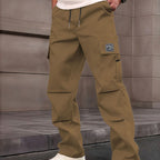 A pair of Arenzza men's multi-pocket straight-leg cargo pants with multiple functional pockets on beige fabric.