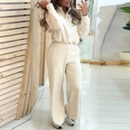 A woman wearing a women's Arenzza pullover top and high waist pants set, casual outfit in neutral tones.