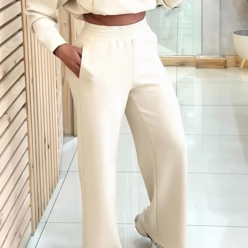 Women’s Arenzza pullover top and high waist pants set, featuring a cozy sweater and stylish matching trousers in a casual outfit.