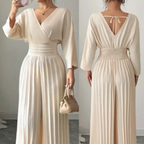 Aarenza elegant v-neck pleated wide-leg jumpsuit in soft fabric, featuring a stylish design perfect for any occasion.