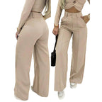 Women's high-waist wide-leg solid color trousers by Arenzza, showcasing the relaxed fit and smooth fabric.