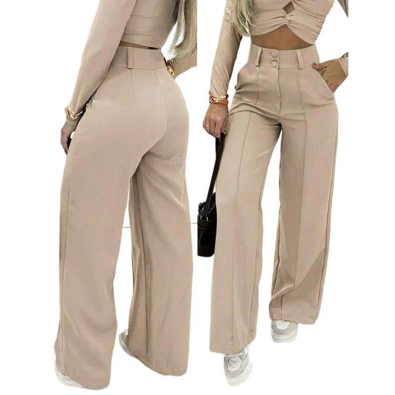 Women's high-waist wide-leg solid color trousers by Arenzza, showcasing the relaxed fit and smooth fabric.