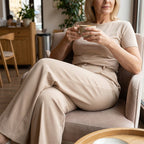 Women's high-waist wide-leg solid color trousers by Arenzza, shown in a neutral tone, with a relaxed fit and clean design.