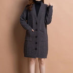 Women's long V-neck knit cardigan with pockets by Arenzza, featuring a soft, cozy fabric and stylish design.