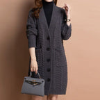 Women's long V-neck knit cardigan with pockets by Arenzza, featuring a cozy, lightweight design and front pocket details.
