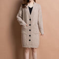 Women's long V-neck knit cardigan with pockets by Arenzza, shown in a cozy, soft fabric with a relaxed fit and front pockets.