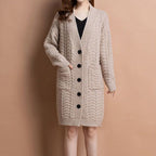 Women's long V-neck knit cardigan with pockets by Arenzza, shown in a cozy, soft fabric with a relaxed fit and front pockets.