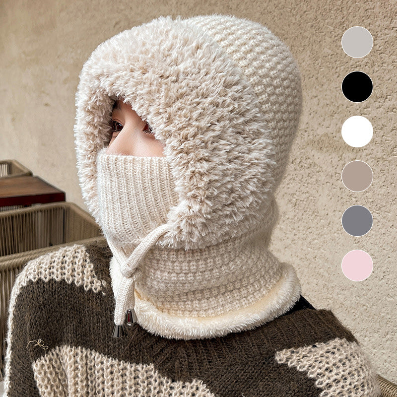 A woman wearing the Arenzza 3-in-1 winter balaclava featuring a cozy, versatile fleece and knit design for cold weather warmth.