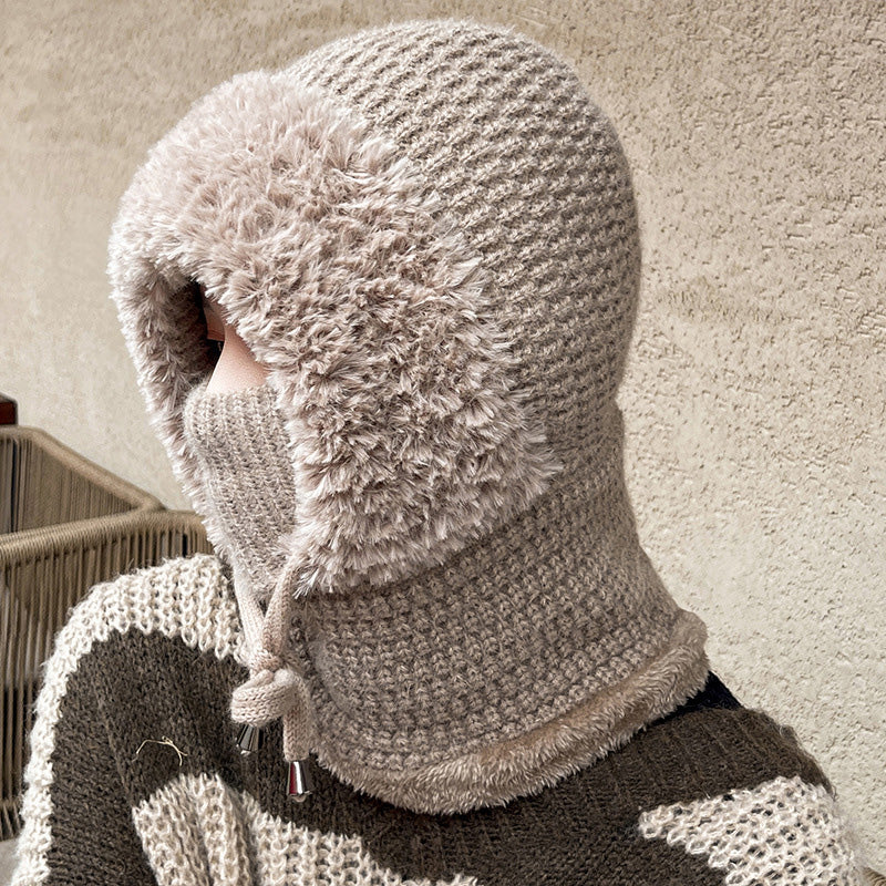 A woman wearing the Arenzza 3-in-1 winter balaclava, showing its versatile design for cold weather protection and warmth.