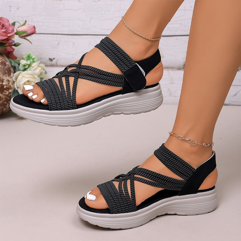 A pair of Arenzza women's elastic strap platform sport sandals with thick soles and open toes, ideal for all-day comfort.