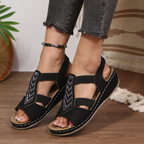 A pair of summer rhinestone wedge sandals for women by Arenzza, featuring sparkling rhinestones and a comfortable wedge heel.