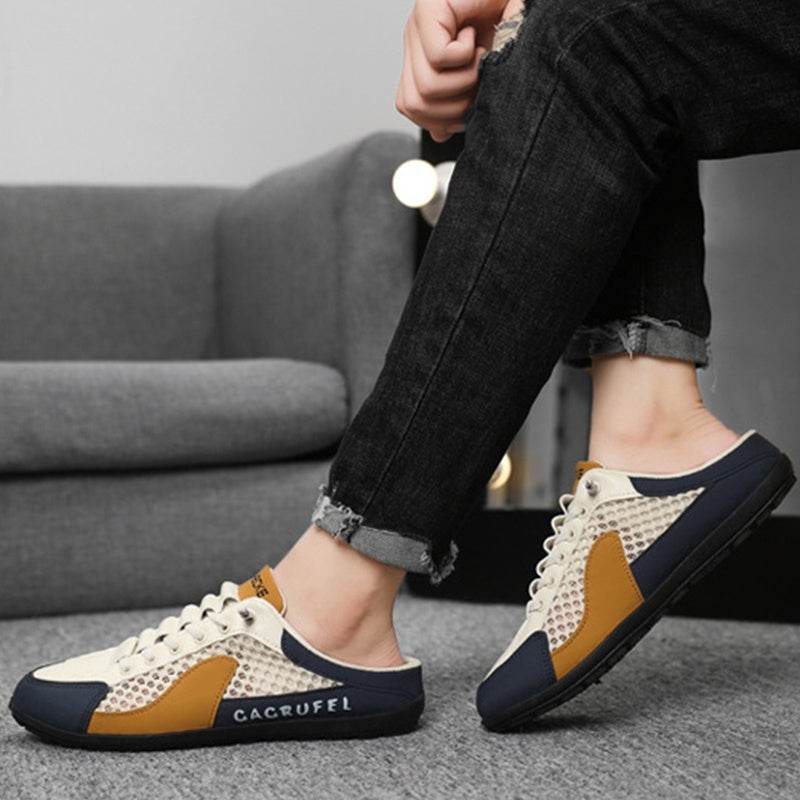 A pair of men's breathable mesh slip-on half slippers by Arenzza, featuring lightweight design and casual comfort.