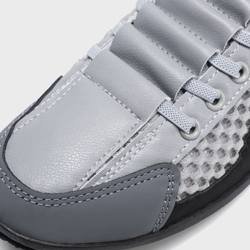 Men’s breathable mesh slip-on half slippers by Arenzza, showcasing lightweight, comfortable slip-on footwear with breathable mesh fabric.