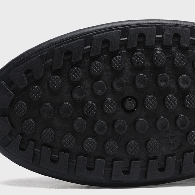 A pair of men's breathable mesh slip-on slippers by Arenzza, showing the lightweight design and soft fabric upper.