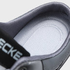 A pair of Arenzza men's breathable mesh slip-on half slippers with open toes and soft fabric, suitable for indoor comfortable wear.