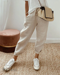 A pair of beige ankle-length cotton linen pants by Arenzza, high-waisted, breathable, and stylish for comfortable everyday wear.