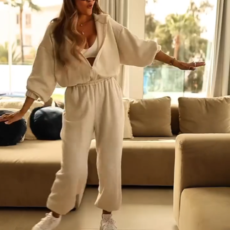 Aarenza women's casual hooded jumpsuit in soft fabric, featuring a hood, long sleeves, and a relaxed fit, ideal for everyday wear.