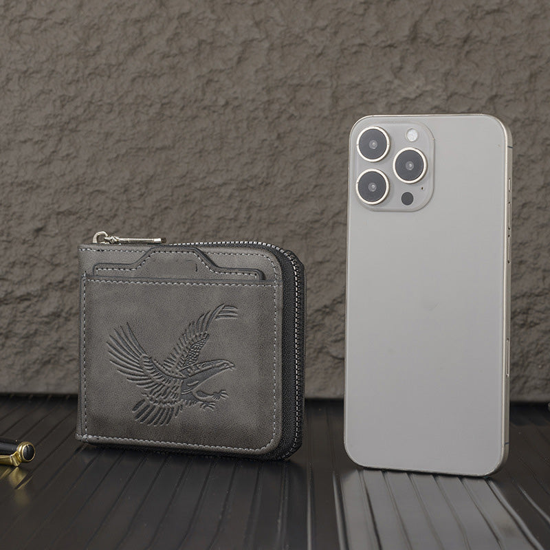 A men's eagle embossed wallet by Arenzza showing textured leather with eagle design and multiple card slots on a neutral background.