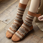 A pair of retro ethnic style socks from Arenzza featuring vibrant patterns and bold colors, perfect for casual wear.