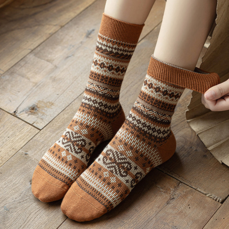 A pair of retro ethnic style socks from Arenzza featuring vibrant patterns and bold colors, perfect for casual wear.