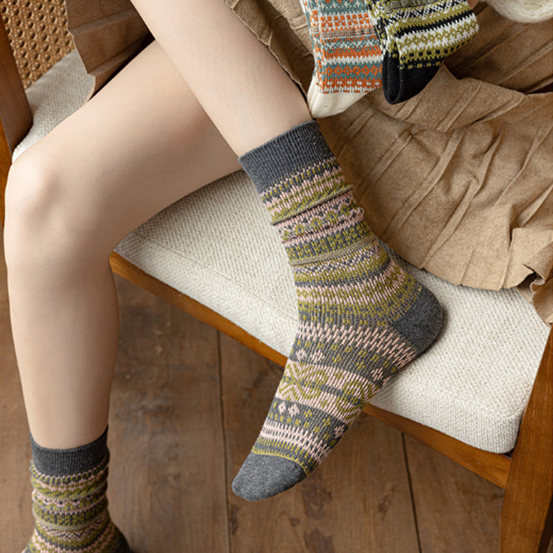 A pair of retro ethnic style socks by Arenzza featuring vibrant patterns and traditional design elements.