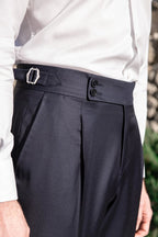 A pair of men's solid color straight casual trousers by Arenzza, displayed flat in a neutral setting.