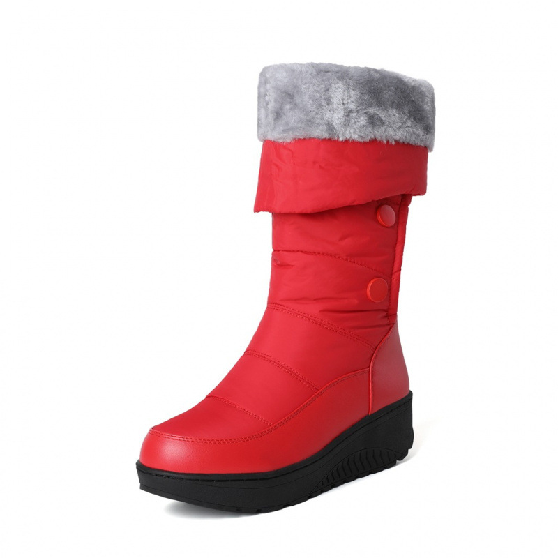 A pair of Arenzza women's waterproof knee-high snow boots with warm lining, suitable for winter snow and cold weather.