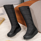Women's warm lined waterproof knee-high snow boots by Arenzza, featuring insulated lining and sturdy waterproof design.
