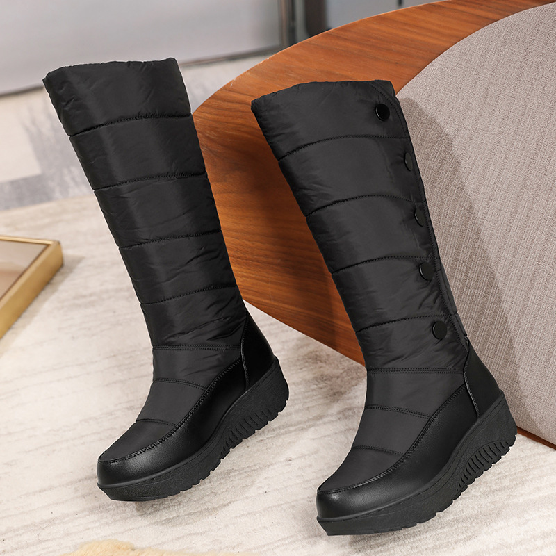 Women's warm lined waterproof knee-high snow boots by Arenzza, featuring insulated lining and sturdy waterproof design.