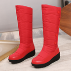 Women's Arenzza waterproof knee-high snow boots with warm lining, ideal for winter weather and snowy conditions.