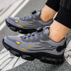 Arenzza non-slip safety shoes with shock-absorbing studs, featuring a durable design for safety and comfort.